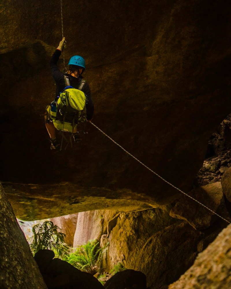 Abseiling into a cave at Mt Buffalo